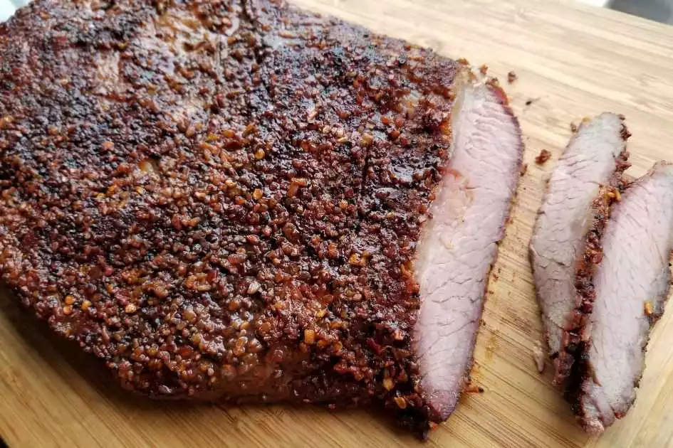 brined and marinated smoked brisket on a cutting board