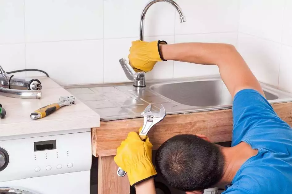 household installing a faucet without hiring plumber